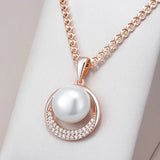 Opulent Pearl Halo Pendant Necklace